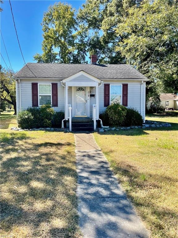 view of front of house with a front lawn