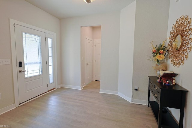 entrance foyer featuring light hardwood / wood-style floors