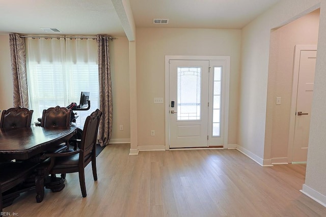 foyer entrance featuring light hardwood / wood-style floors