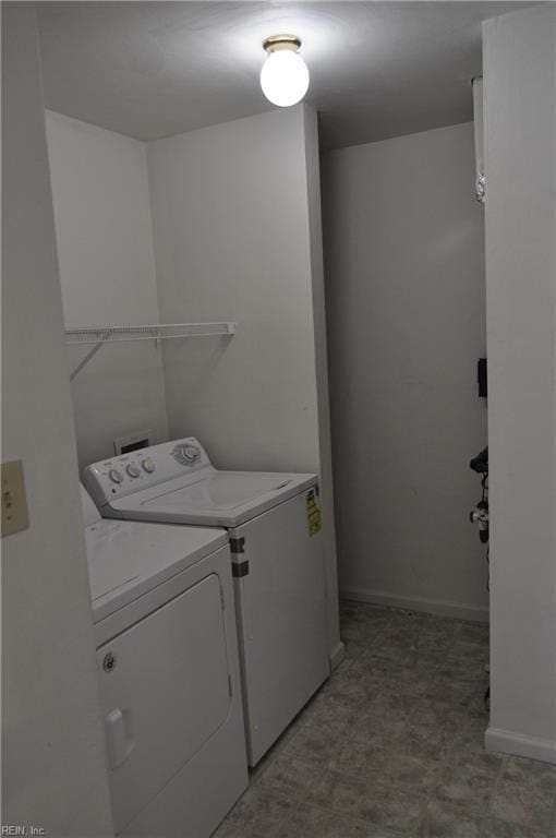 laundry room with washer and clothes dryer