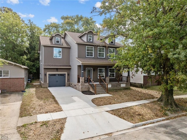 view of front of house with a garage and covered porch