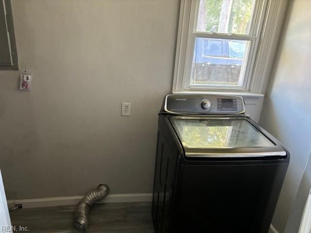 laundry room featuring washer / dryer and electric panel