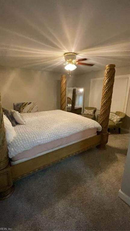 carpeted bedroom featuring ceiling fan