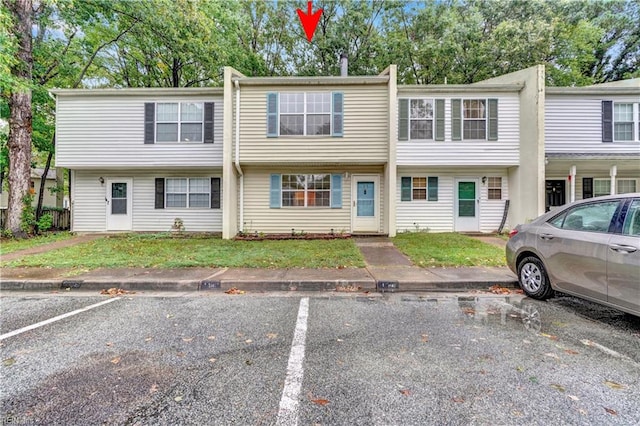 view of property with a front lawn