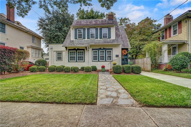 view of front of home with a front yard