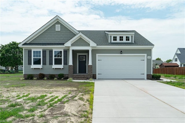 craftsman-style house featuring a garage