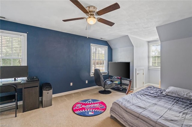 bedroom featuring vaulted ceiling, carpet, and ceiling fan