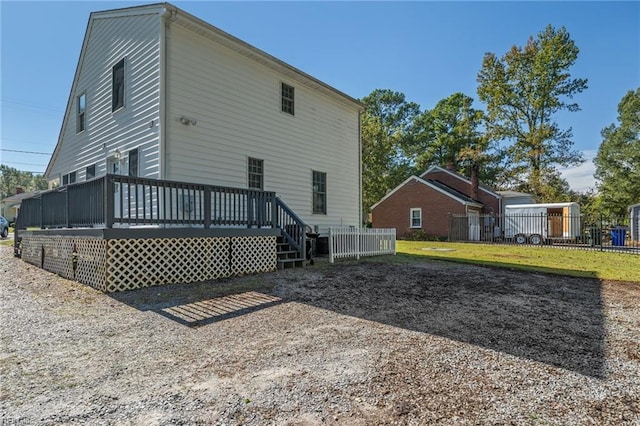 rear view of property with a deck