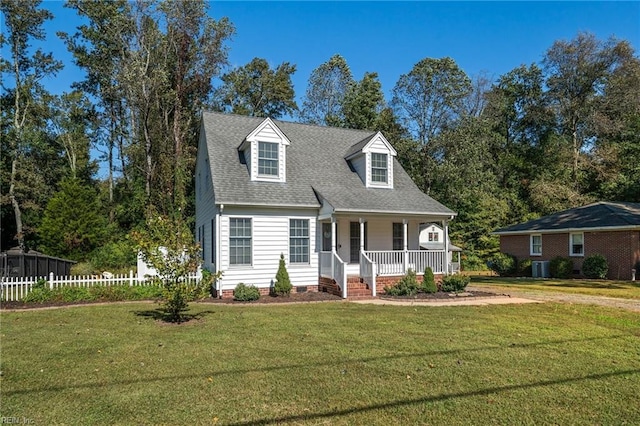 cape cod-style house with a front yard, cooling unit, and a porch