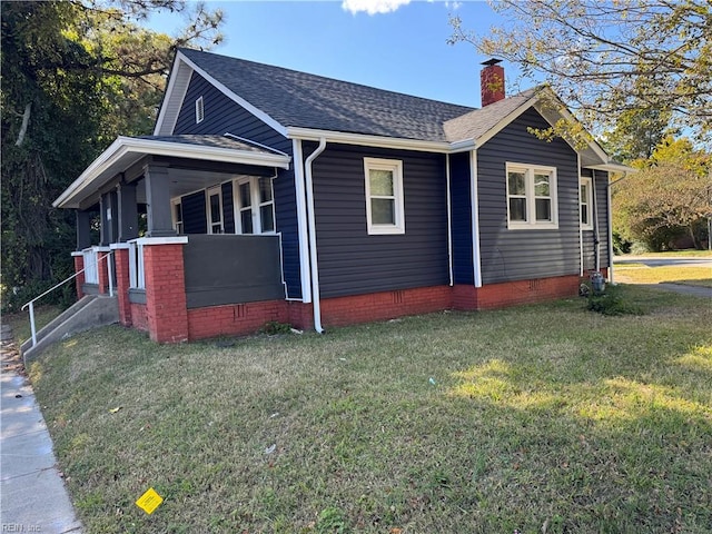 view of home's exterior featuring a yard