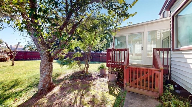 view of yard featuring a sunroom