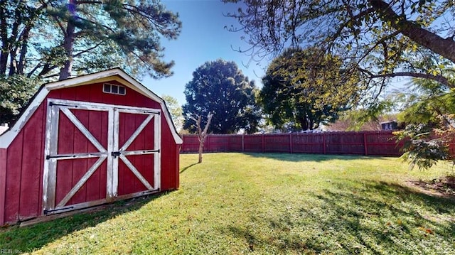 view of outbuilding featuring a lawn