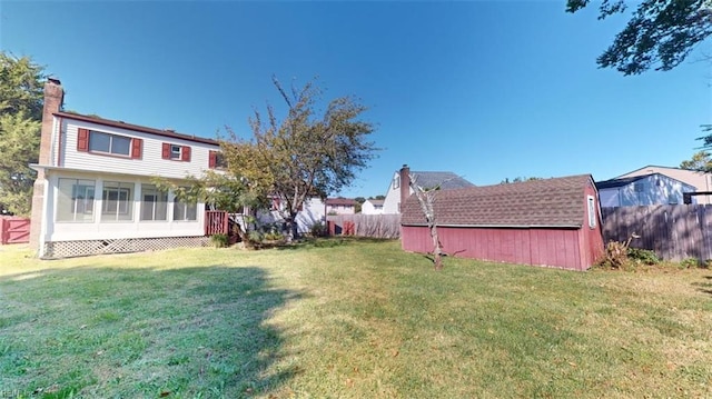 view of yard with a sunroom