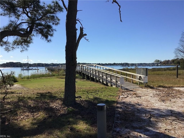 dock area featuring a water view