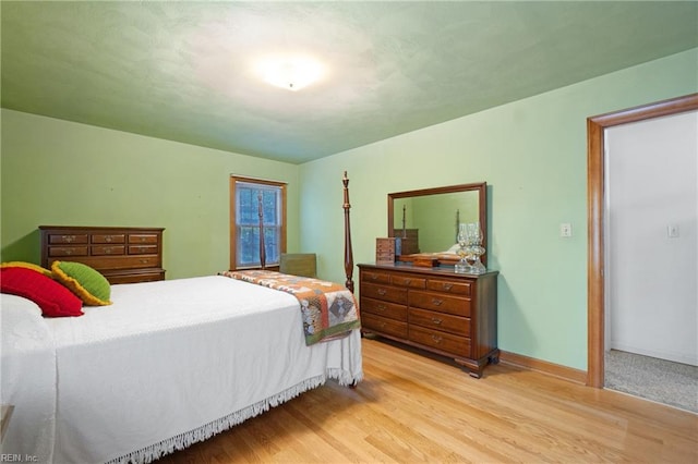 bedroom with light hardwood / wood-style floors