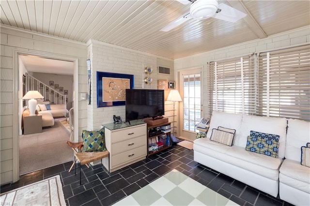 living room with wood ceiling and ceiling fan