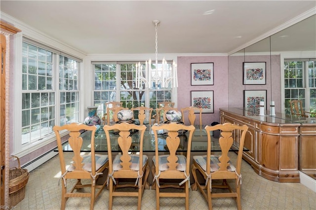 dining room featuring ornamental molding, a chandelier, and plenty of natural light