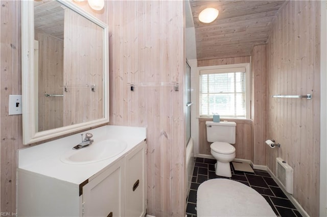 full bathroom featuring vanity, wooden walls, toilet, and wooden ceiling