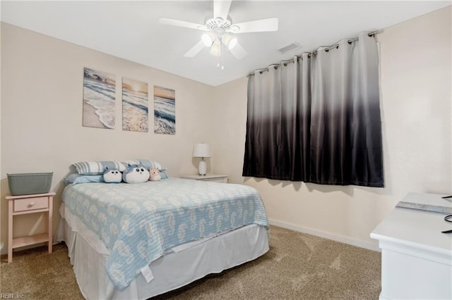 bedroom with ceiling fan and light colored carpet