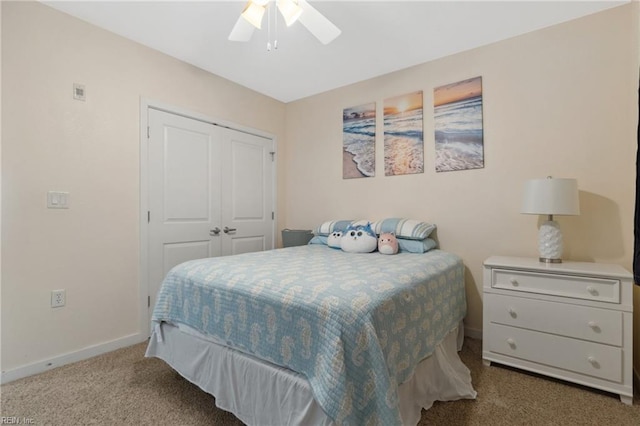 bedroom with a closet, carpet flooring, and ceiling fan