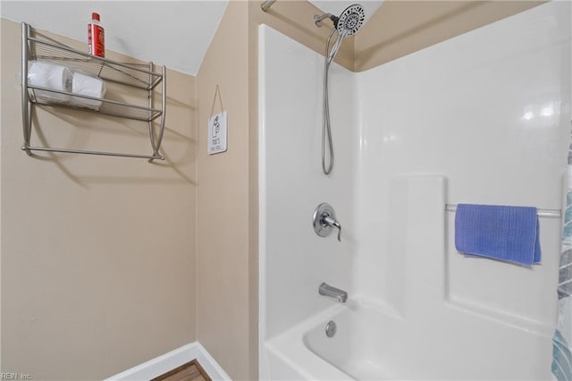 bathroom with shower / bathtub combination