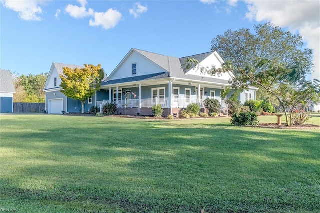 back of house with a yard and covered porch