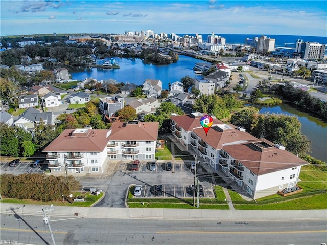 drone / aerial view with a water view