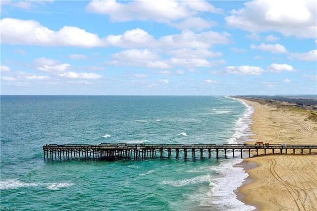 property view of water featuring a beach view