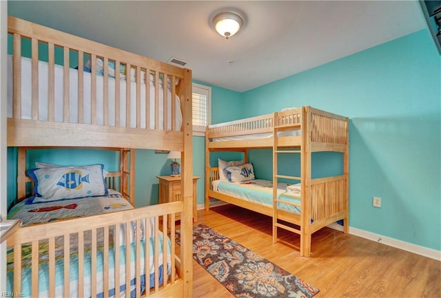 bedroom featuring hardwood / wood-style floors