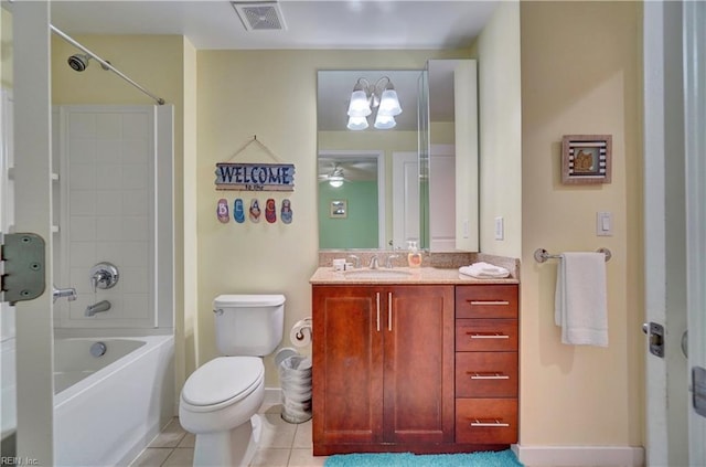 full bathroom with ceiling fan,  shower combination, toilet, vanity, and tile patterned floors