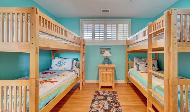 bedroom featuring light hardwood / wood-style floors