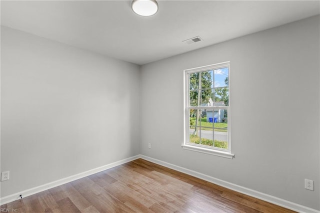 empty room featuring light hardwood / wood-style floors