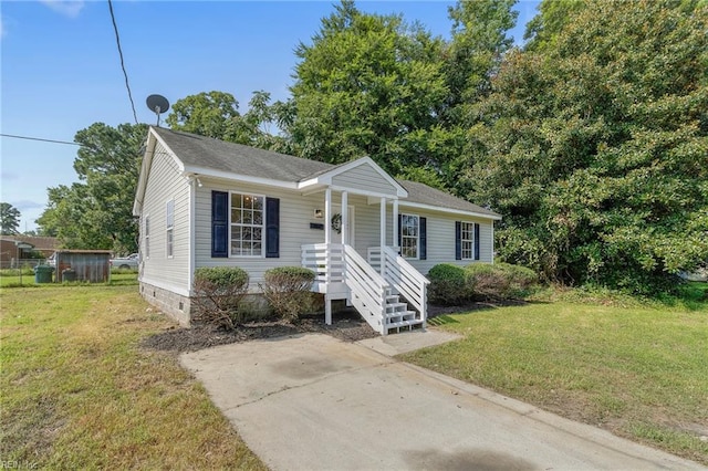 view of front of home with a front yard