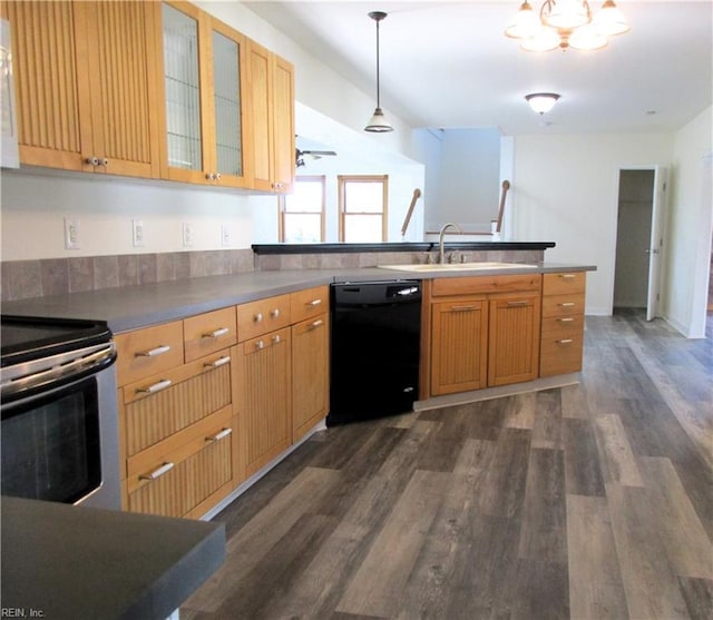 kitchen featuring black dishwasher, electric range, dark hardwood / wood-style floors, sink, and hanging light fixtures