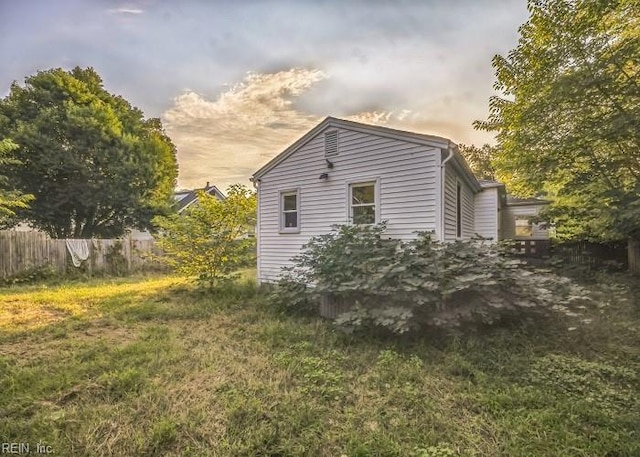 view of property exterior at dusk