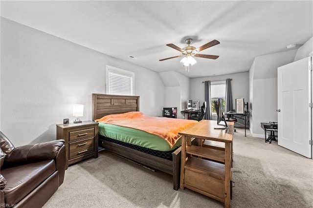 bedroom with light colored carpet and ceiling fan