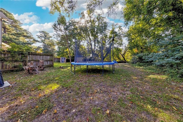 view of yard with a trampoline