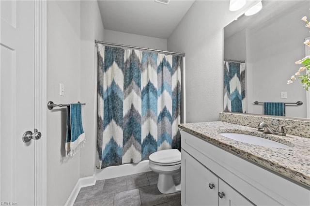 full bathroom with vanity, toilet, shower / bath combo with shower curtain, and tile patterned flooring