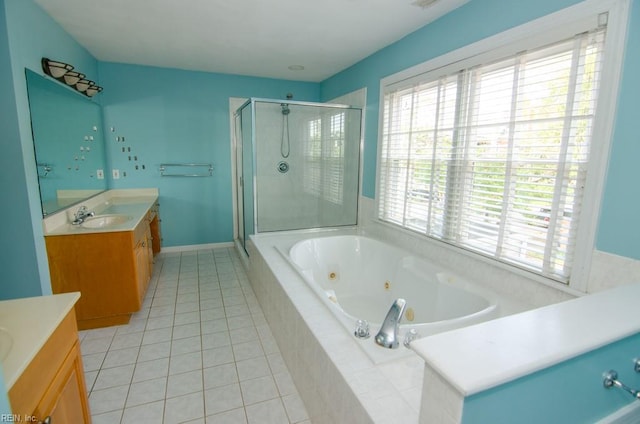 bathroom featuring vanity, independent shower and bath, and tile patterned floors