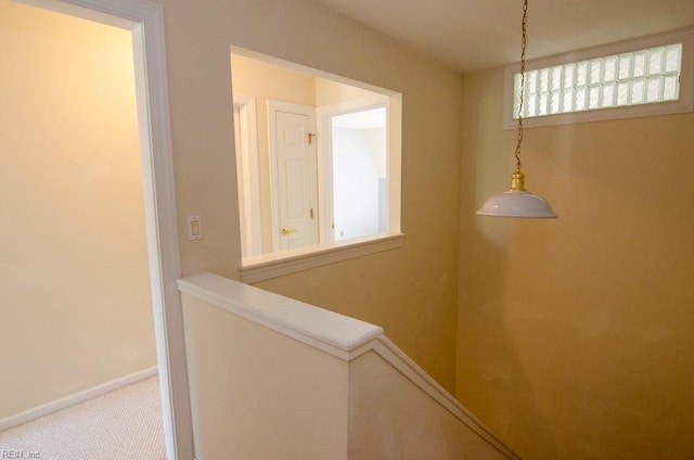 corridor featuring carpet flooring