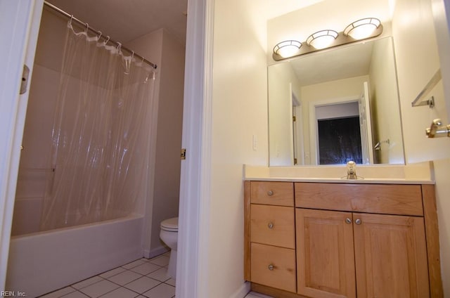 full bathroom featuring vanity, toilet, shower / bath combo with shower curtain, and tile patterned flooring