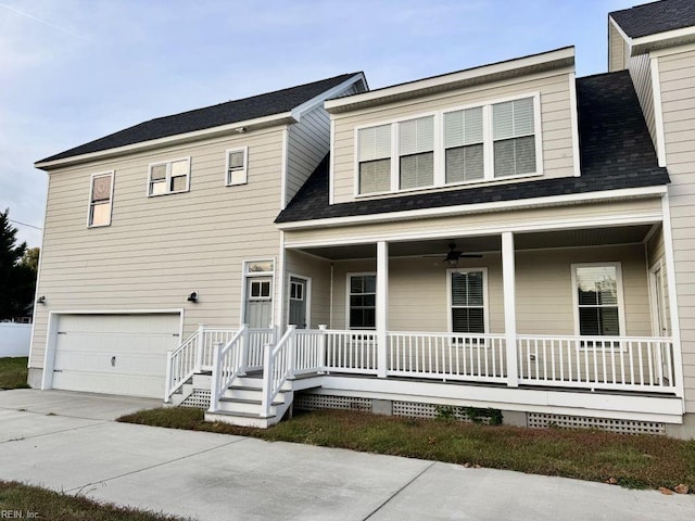 view of front of home featuring a garage, ceiling fan, and a porch