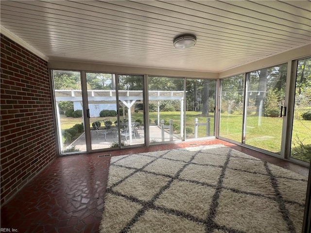 unfurnished sunroom with a healthy amount of sunlight