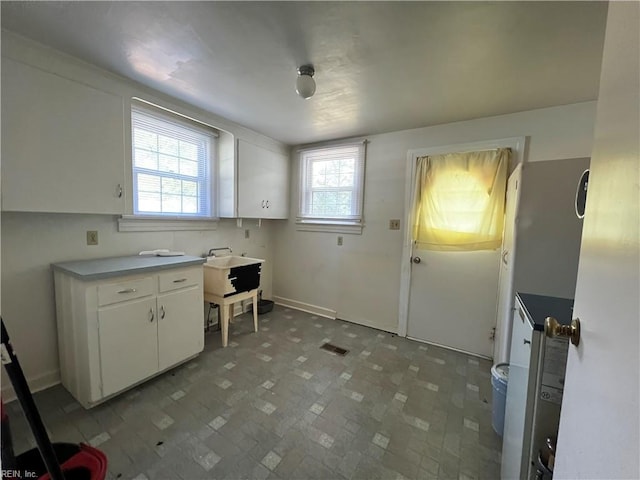 kitchen with white cabinetry