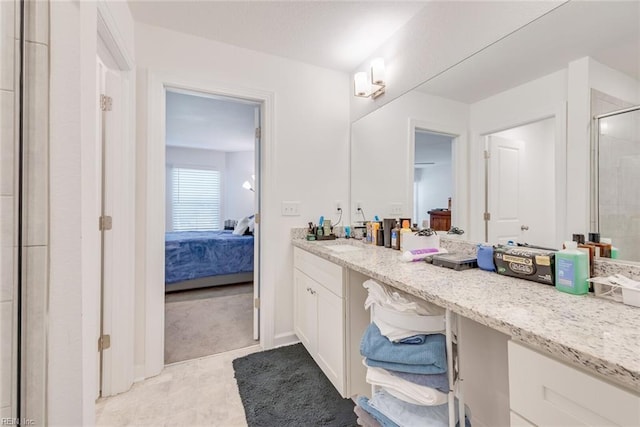 bathroom featuring vanity and walk in shower