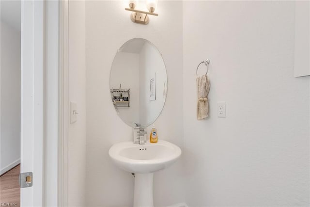 bathroom featuring hardwood / wood-style flooring