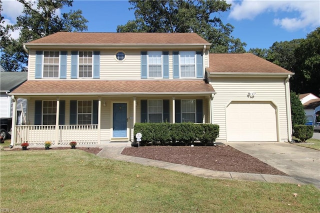 colonial home with a front yard, a porch, and a garage