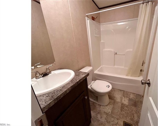 full bathroom featuring vanity, toilet, and shower / bath combination with curtain