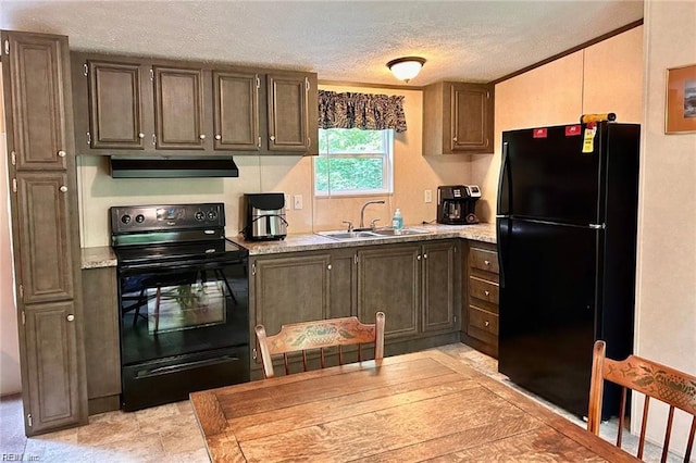 kitchen with black appliances, sink, a textured ceiling, crown molding, and exhaust hood