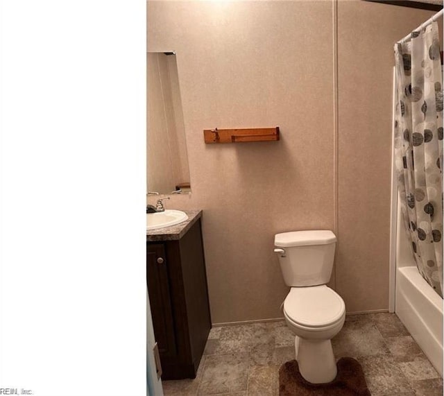 full bathroom featuring vanity, toilet, and shower / tub combo